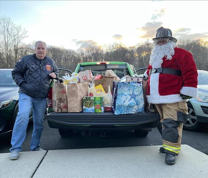 Our Business Development Executive, Bill Wise, collecting donations at Upper Makefield Fire Company's Santa Run